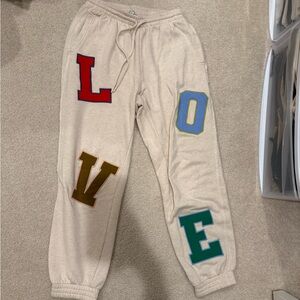 Beige Sweatpants with Colorful Letter Patches LOVE